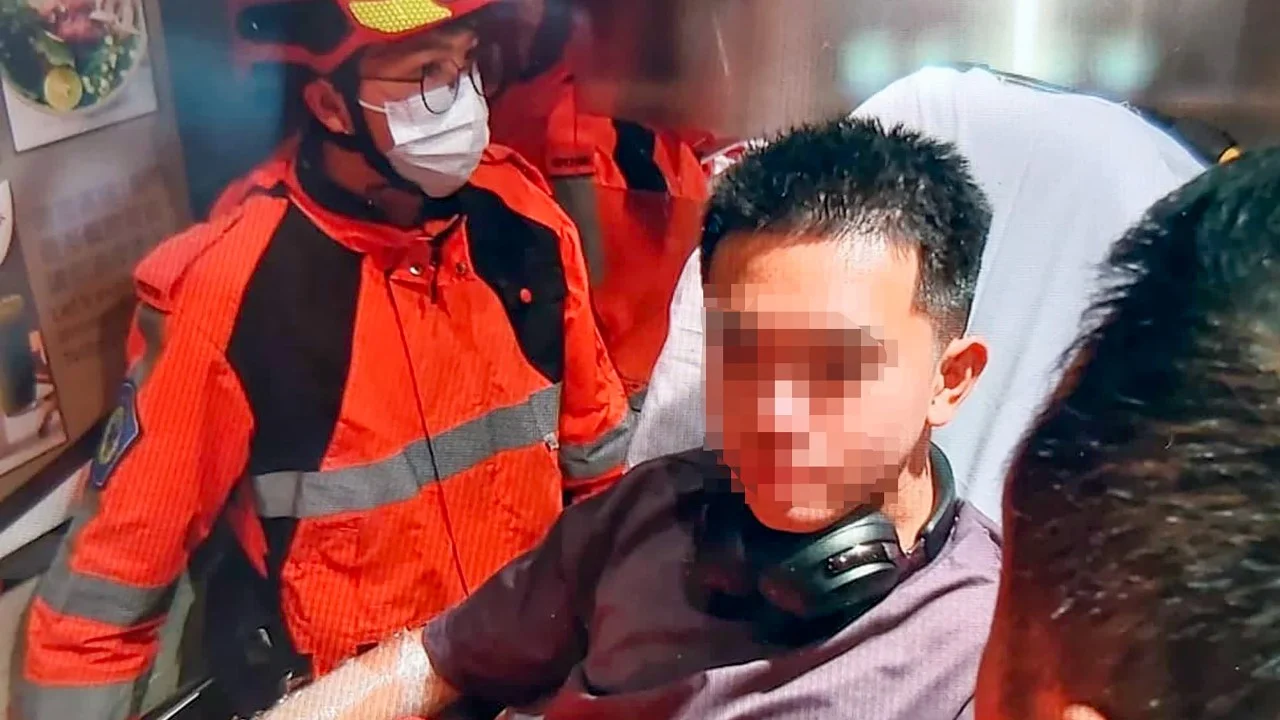 Hong Kong police arrest man after fire inside sports store injures staff member