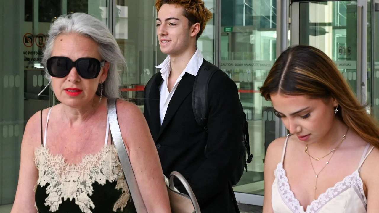 French teen facing jail over straw licking stunt allowed to leave Singapore