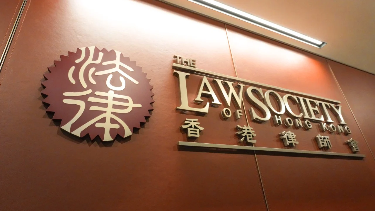 Hong Kong Law Society closes firm linked to crash-for-cash scams