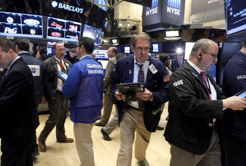 Wall St mixed at open ahead of Big Tech earnings, Fed meeting