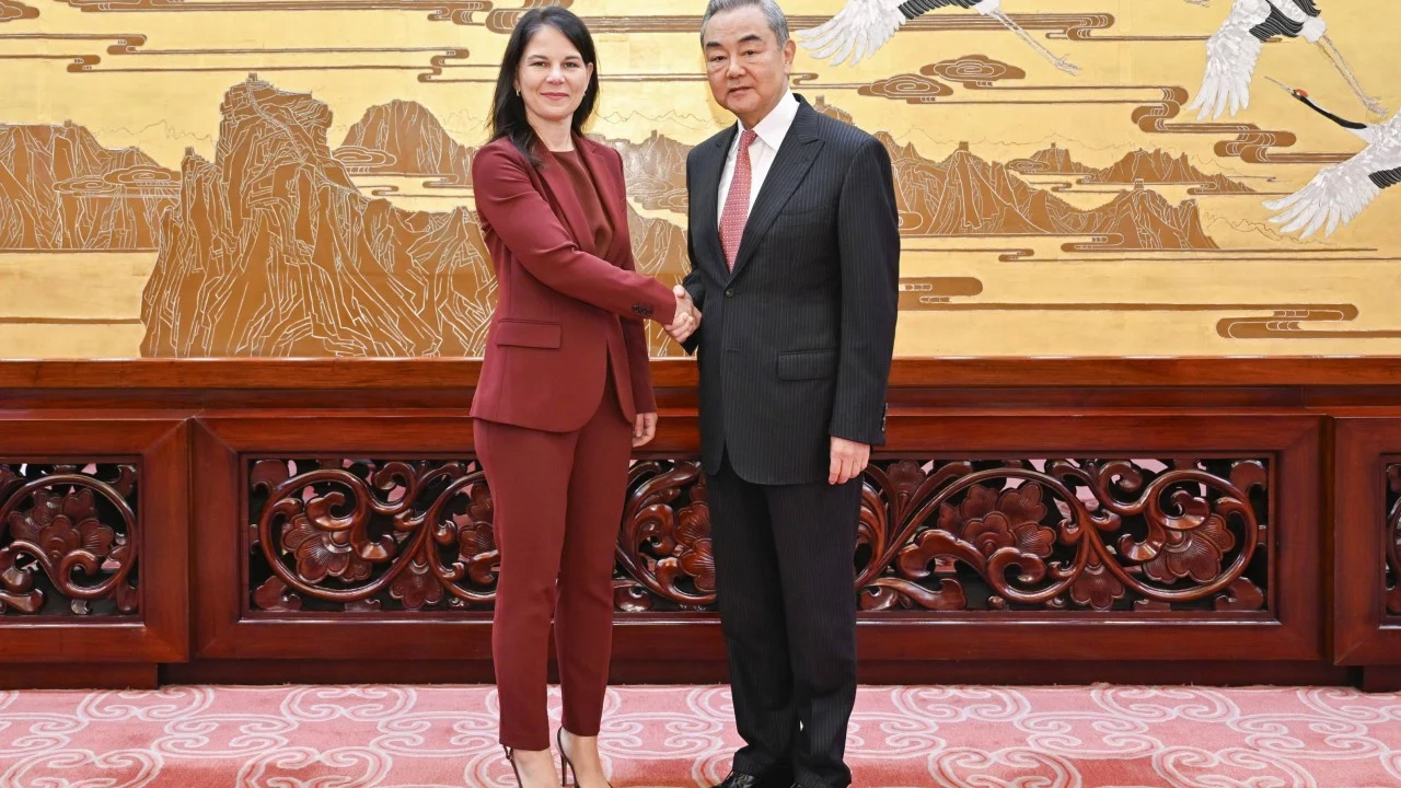 ‘Might over right’ imperils international justice, Wang Yi tells UN’s Baerbock