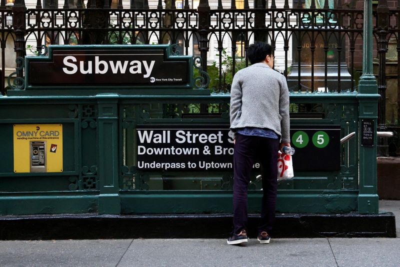 Wall Street ends mixed ahead of big tech earnings